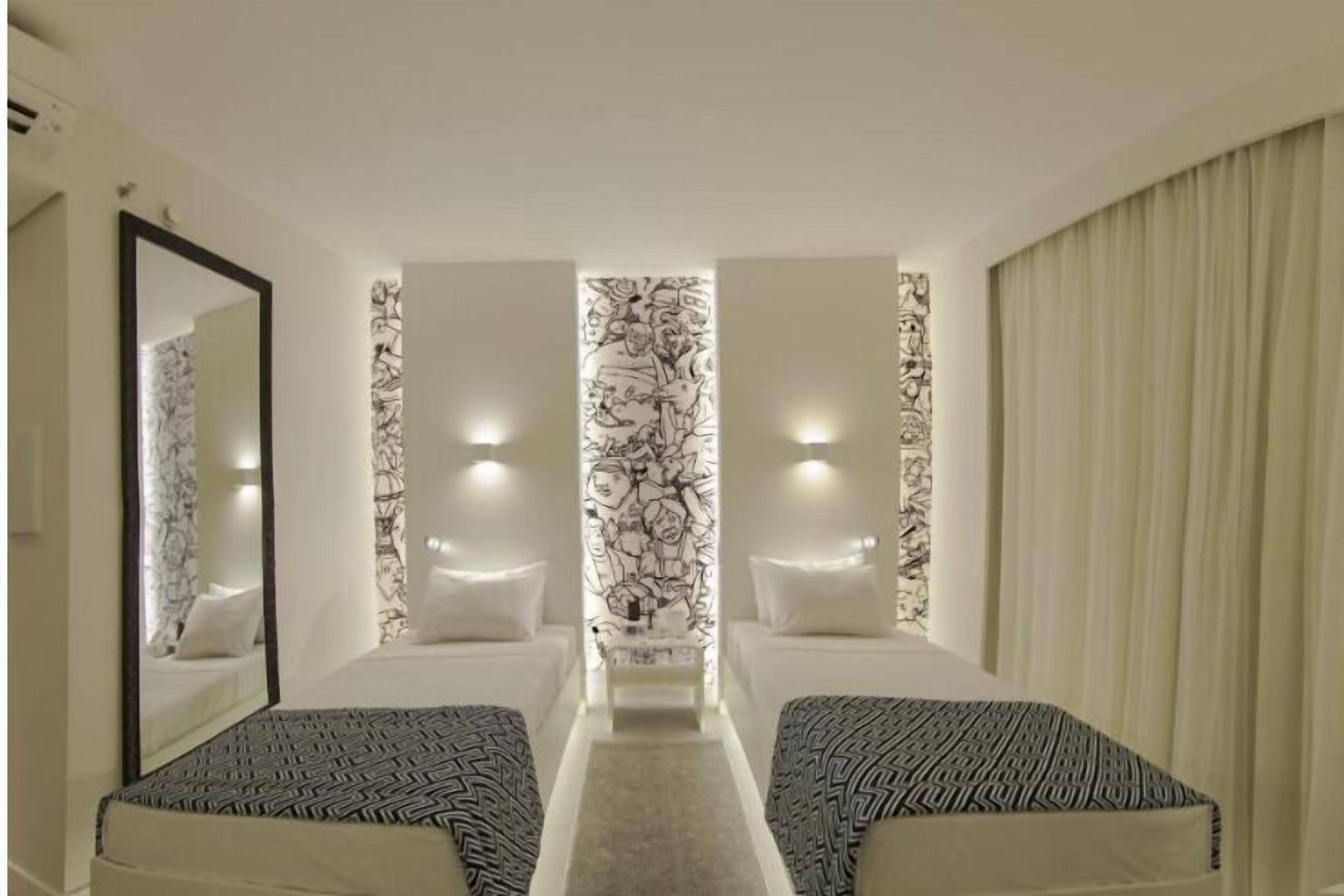 Departamento estándar, 2 camas individuales | Minibar, escritorio, cortinas blackout y insonorización 