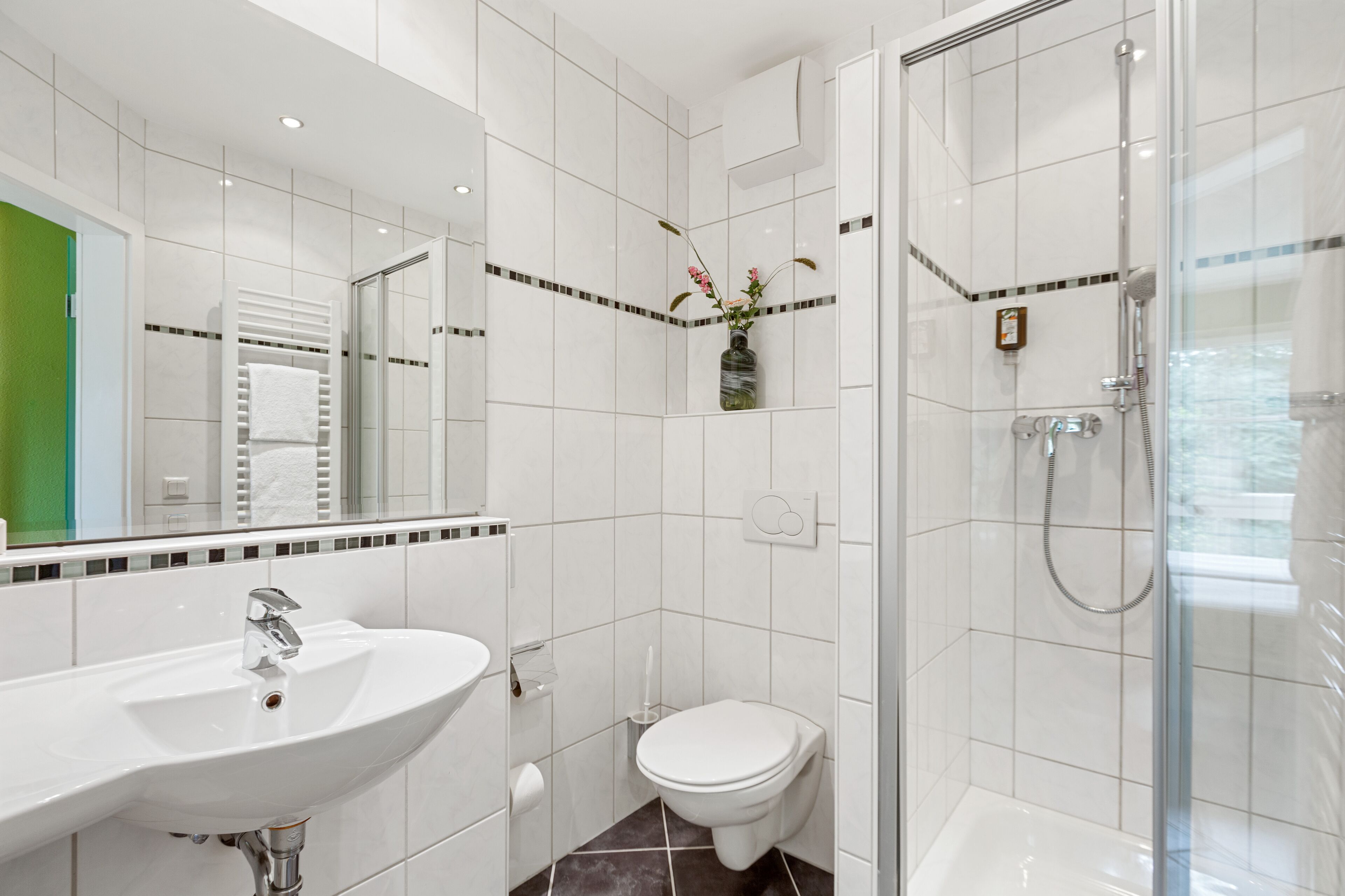 economy single room | bathroom | shower, free toiletries, hair dryer, towels