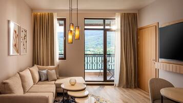 Suite, Lake View (Regency) | In-room safe, desk, blackout drapes, iron/ironing board