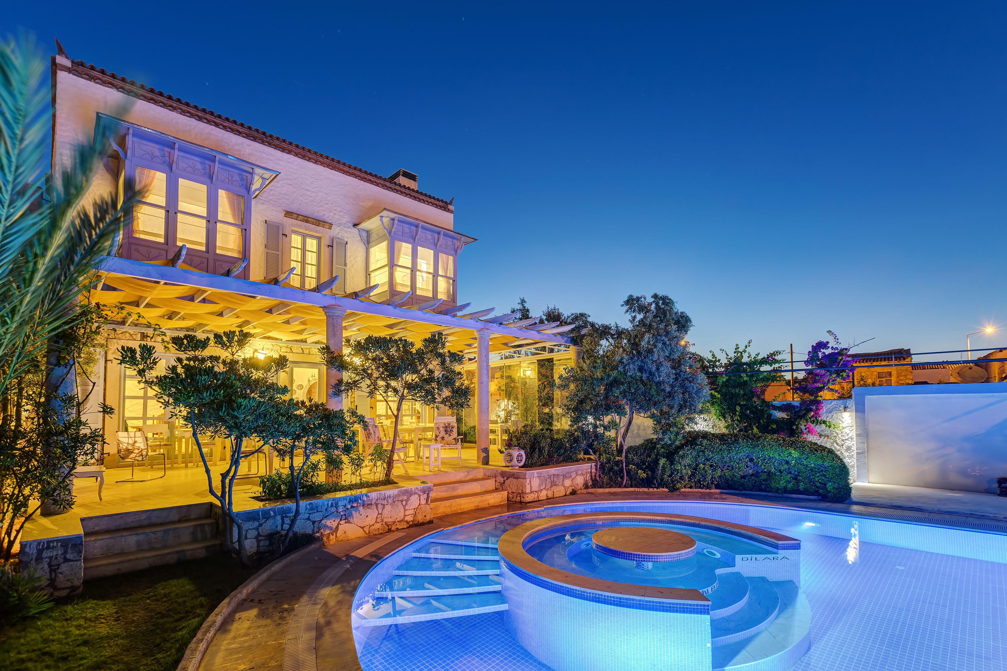 outdoor pool, pool umbrellas, pool loungers