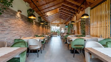 Breakfast, lunch, dinner served; international cuisine, garden views