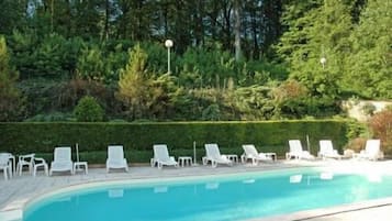 Seasonal outdoor pool, pool umbrellas, pool loungers