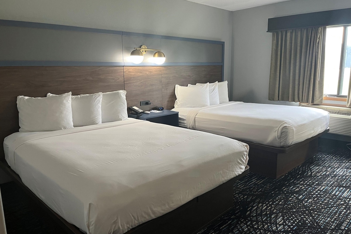 Premium bedding, desk, blackout drapes, iron/ironing board