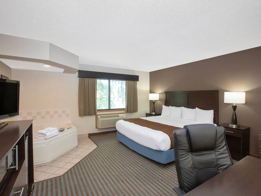 Desk, blackout drapes, iron/ironing board, free cribs/infant beds