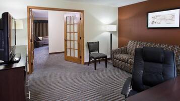 Deluxe Suite, 1 King Bed, Non Smoking | Living area | Flat-screen TV