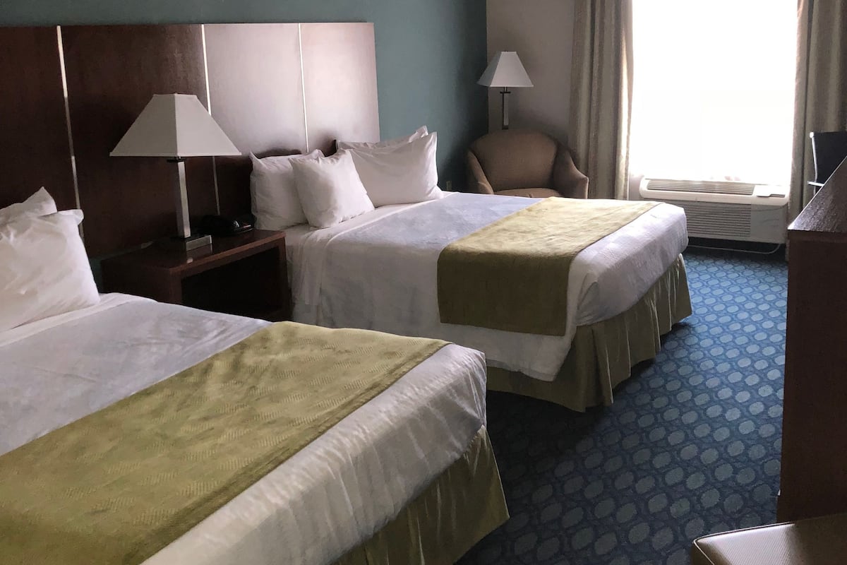 Blackout drapes, iron/ironing board, WiFi (free), bed sheets