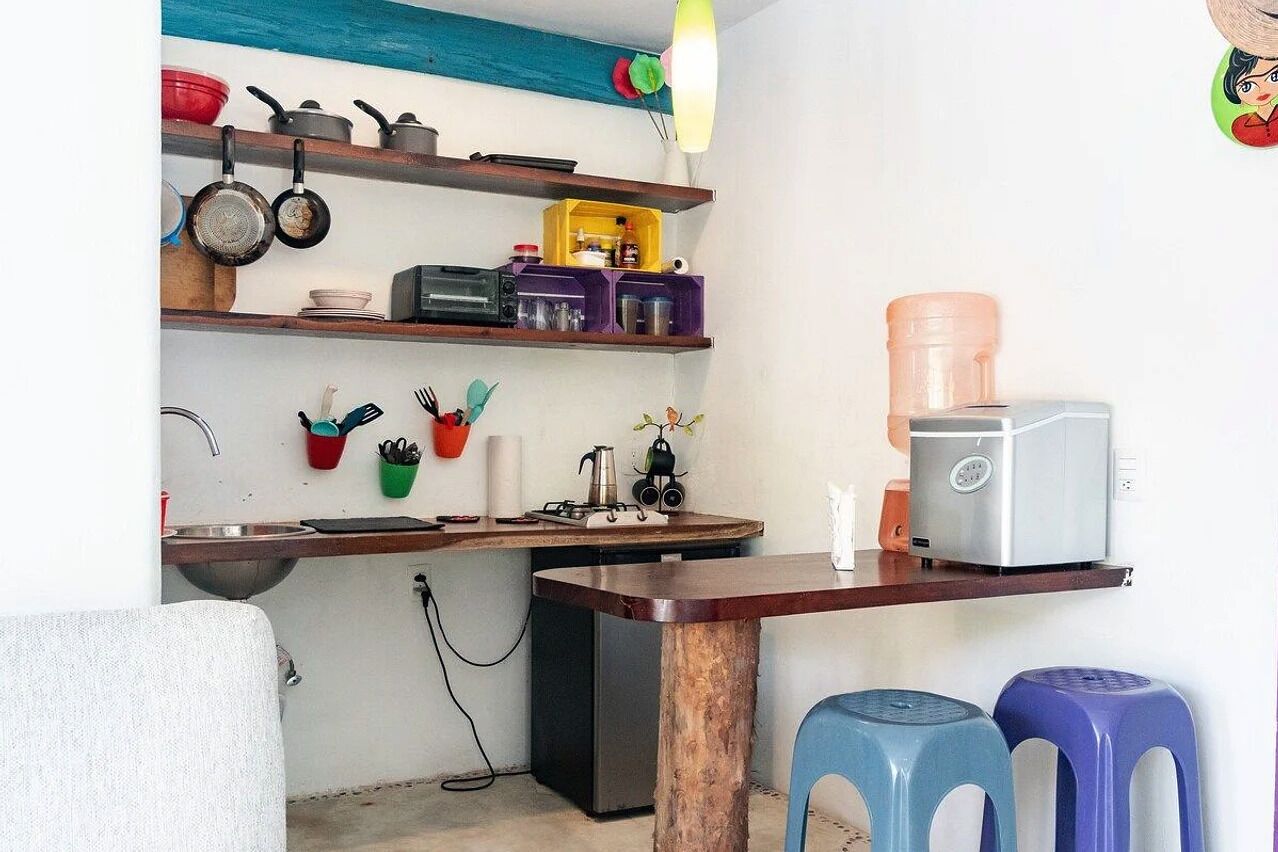 el secreto: downstairs | private kitchen | mini-fridge, stovetop, coffee/tea maker, rice cooker