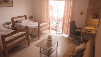 Laptop workspace, blackout curtains, free WiFi, bed sheets