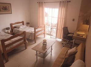 Studio, Private Bathroom (Cocineta) | Laptop workspace, blackout drapes, free WiFi, bed sheets