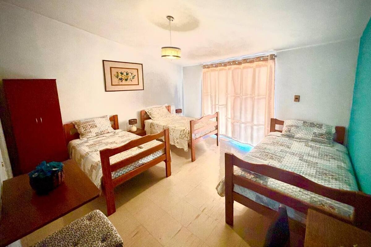 Triple Room, Private Bathroom | 1 bedroom, laptop workspace, blackout drapes, free WiFi