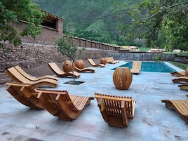 Outdoor pool, pool umbrellas, pool loungers