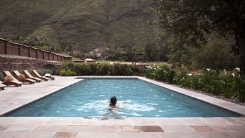 Outdoor pool, pool umbrellas, sun loungers