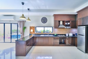 Villa Deluxe, 4 habitaciones, alberca privada | Caja de seguridad en la habitación y cortinas blackout