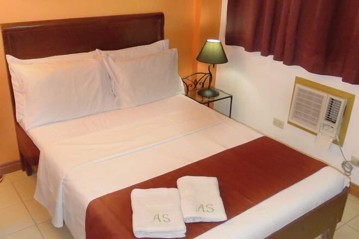 Desk, laptop workspace, cots/infant beds, rollaway beds