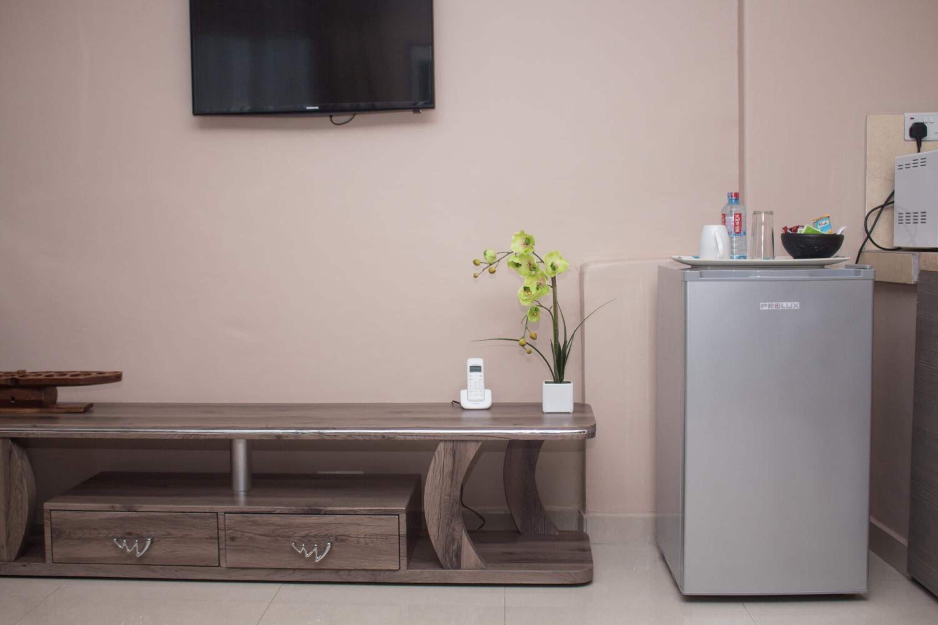 executive apartment | private kitchen | fridge, coffee/tea maker, electric kettle, dining tables