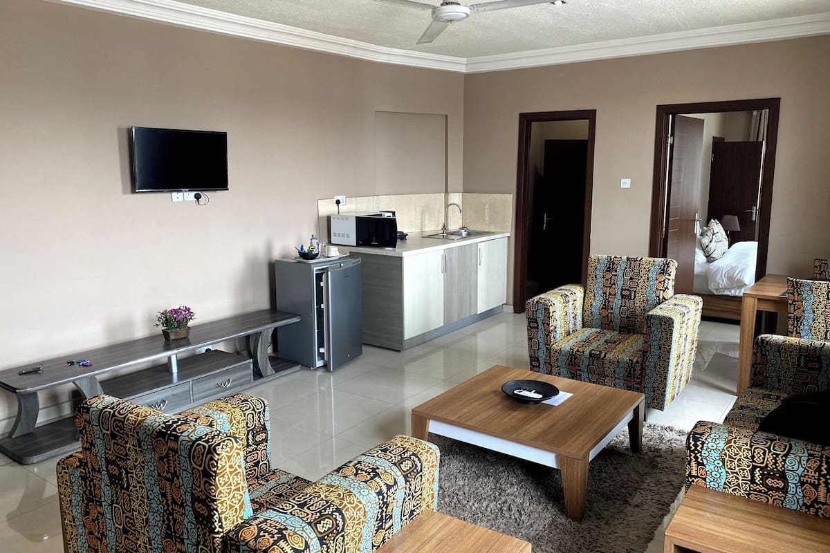 executive apartment | living area | 32-inch flat-screen tv with satellite channels, tv
