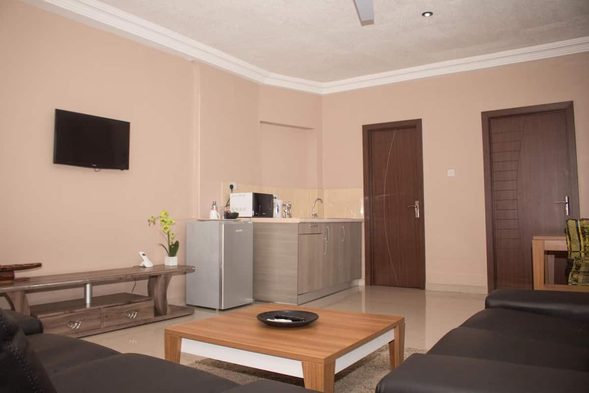 executive apartment | desk, blackout curtains, iron/ironing board, free wifi