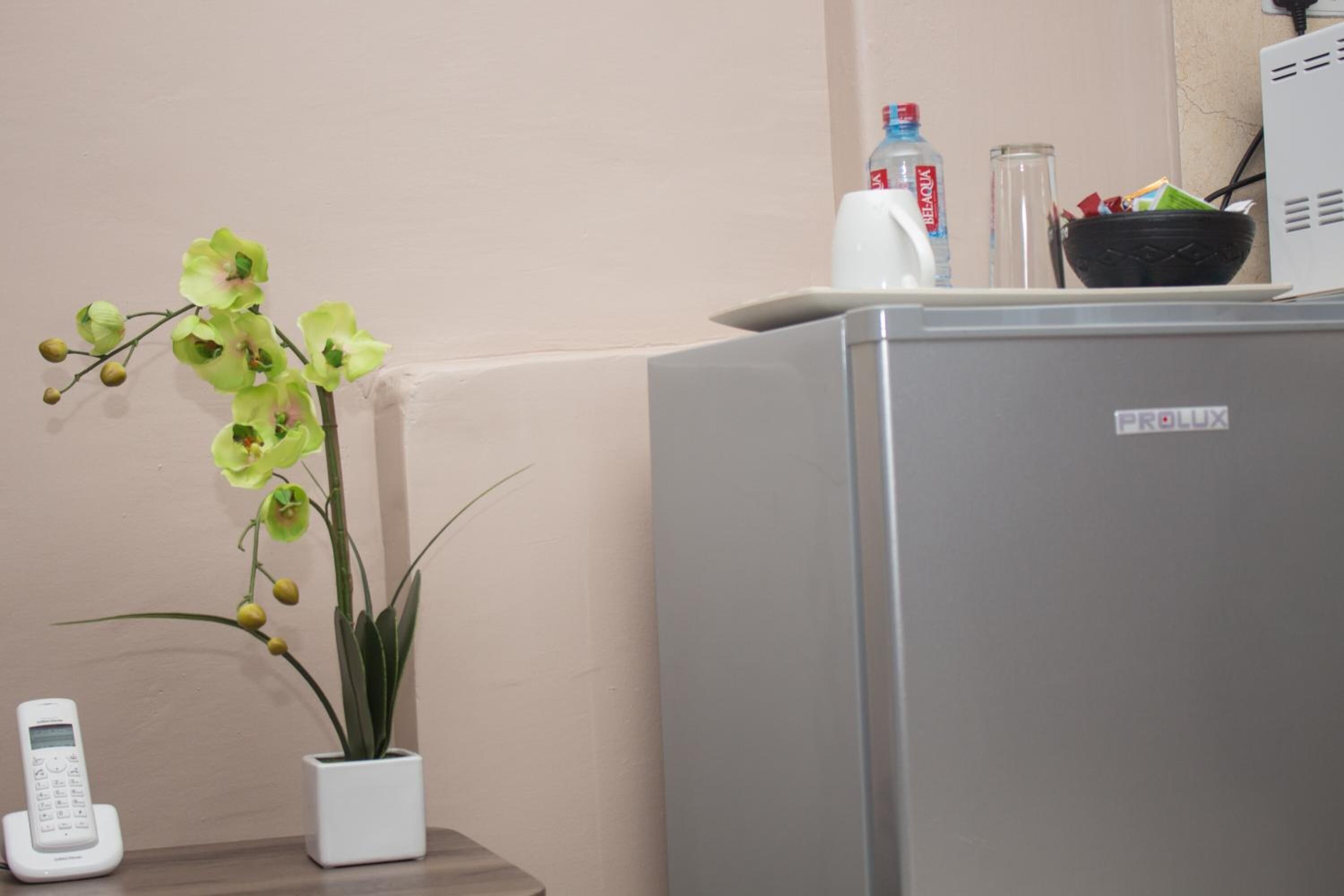 executive apartment | living area | 32-inch flat-screen tv with satellite channels, tv