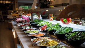 A buffet with various food options including salads, fruits, and vegetables. - Calimera Side Resort - All inclusive (Manavgat)