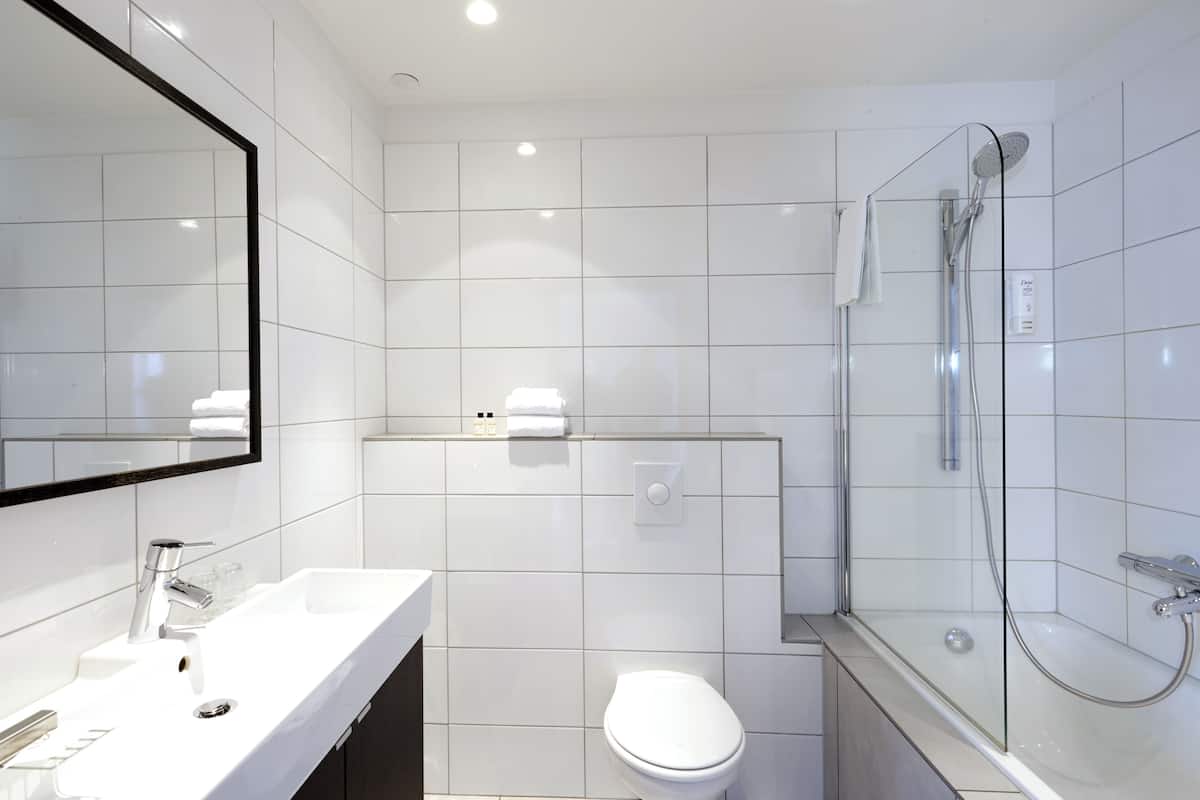 superior room, 1 queen bed, ocean view | bathroom | free toiletries, hair dryer, towels, soap