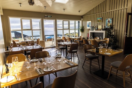 Breakfast and dinner served, local cuisine. Fosshotel Hellnar