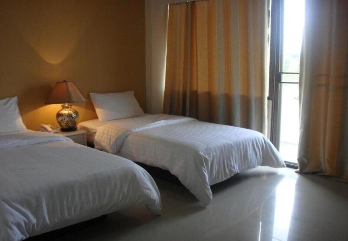 Habitación superior con 2 camas individuales | Escritorio, wifi gratis, ropa de cama