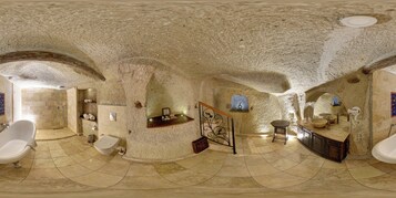 Premium Suite | Minibar, in-room safe, individually decorated, individually furnished