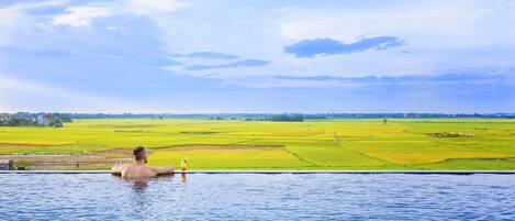 Outdoor pool, pool umbrellas, sun loungers