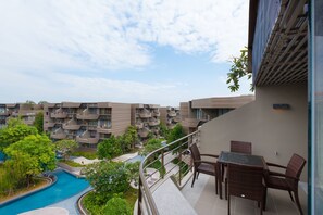 Apartment, 2 Bedrooms, Pool View | In-room safe, blackout curtains - Baan Sanngarm Beachfront Condominium (Cha-am)