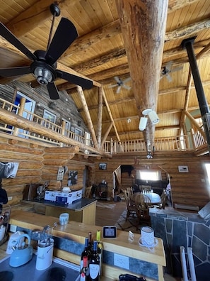 Deluxe Cabin | Living area | 37-inch TV with satellite channels - Sportsman Motel (Melrose)