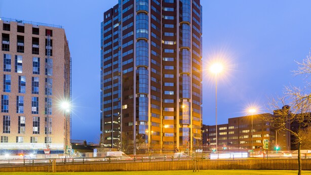 A high-rise building with multiple floors, large windows, and a modern architectural design. - Birmingham Serviced Apartments Hagley Rd (Birmingham)