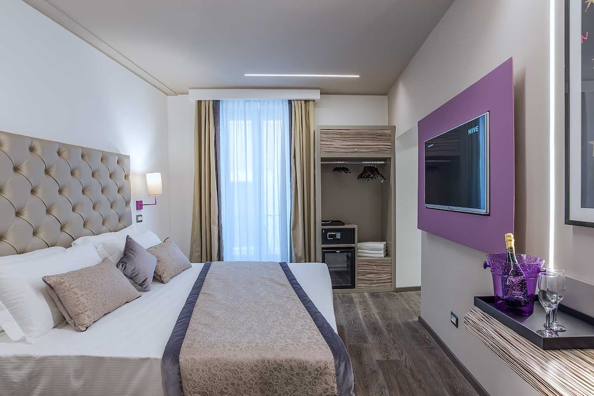 Premium bedding, down comforters, memory foam beds, minibar
