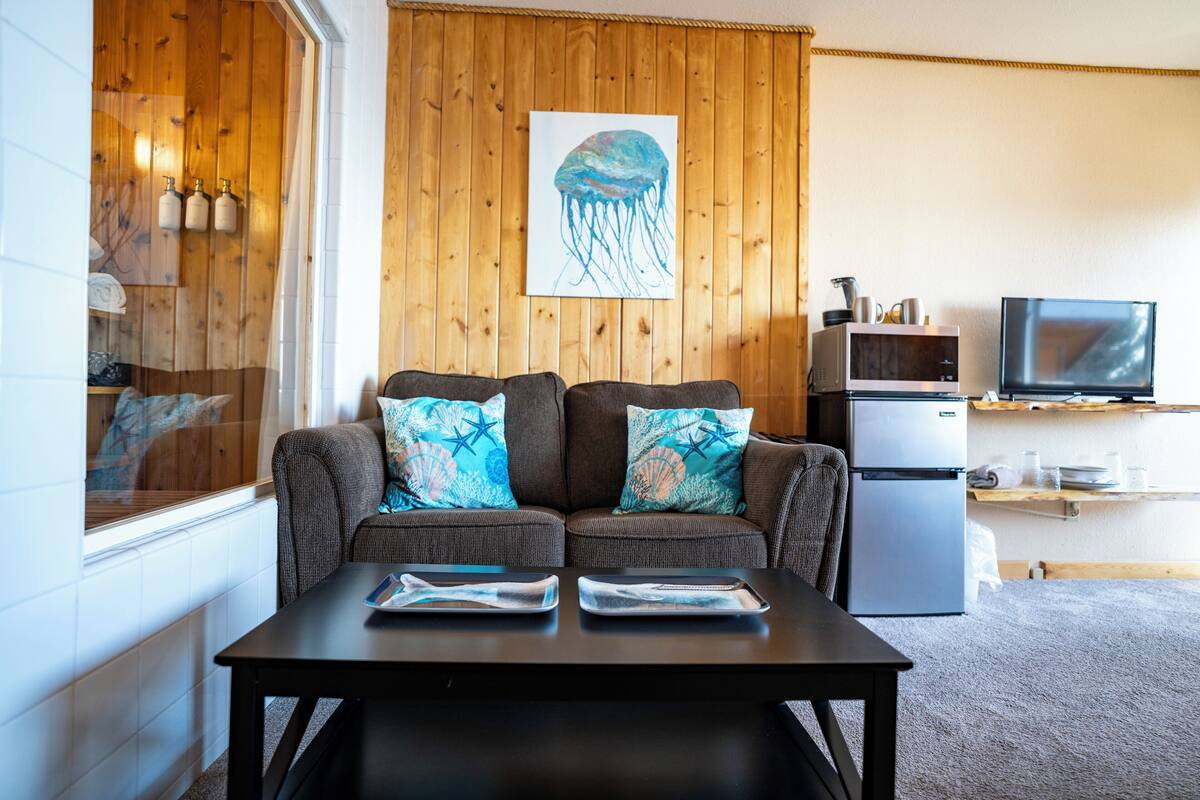 deluxe studio suite, 1 king bed with sofa bed, ocean view, oceanfront | 1 bedroom, premium bedding, individually decorated, iron/ironing board