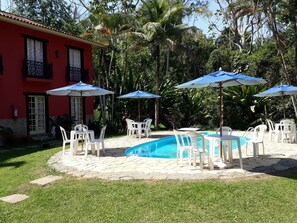 Outdoor pool, pool umbrellas, pool loungers