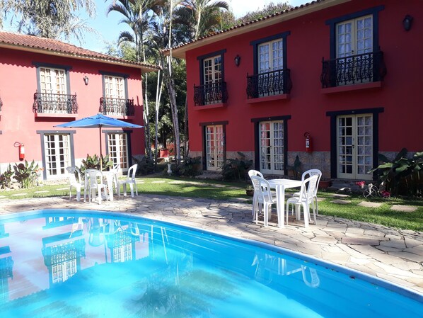 Outdoor pool, pool umbrellas, pool loungers