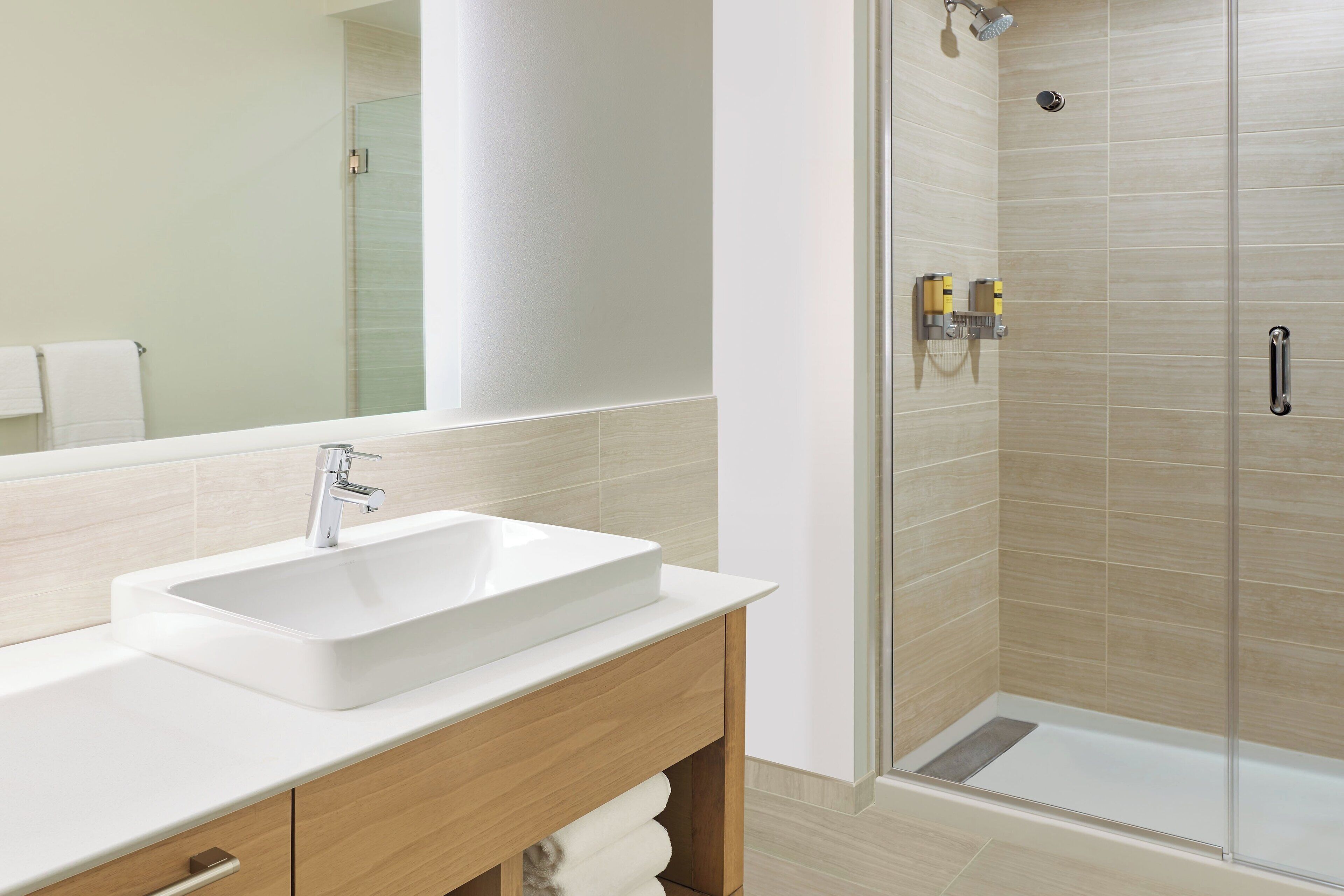 combined shower/bathtub, free toiletries, hair dryer, towels