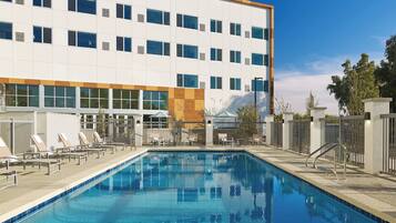 Outdoor pool, pool umbrellas, sun loungers