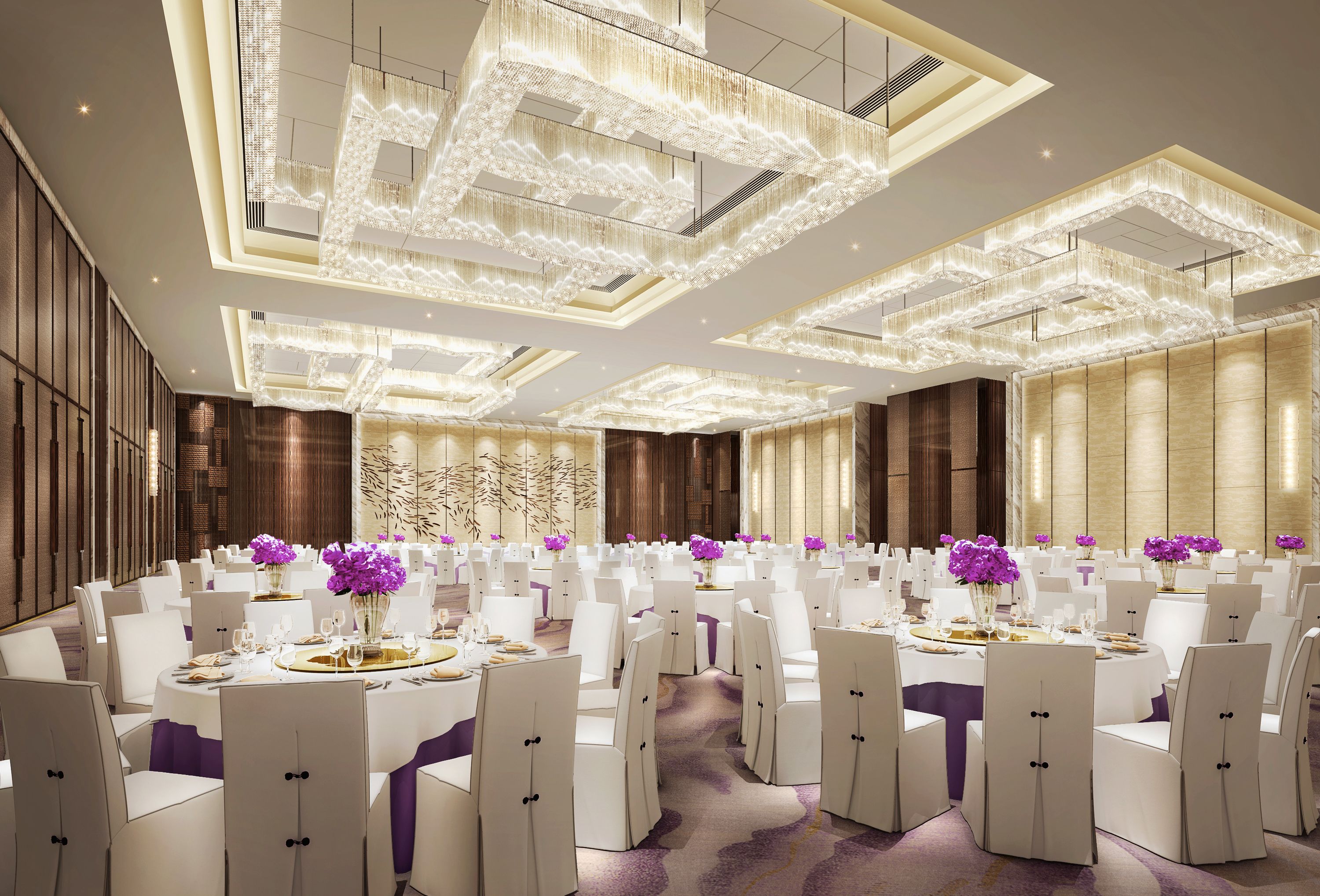 A banquet hall with round tables, white chairs, and purple centerpieces.