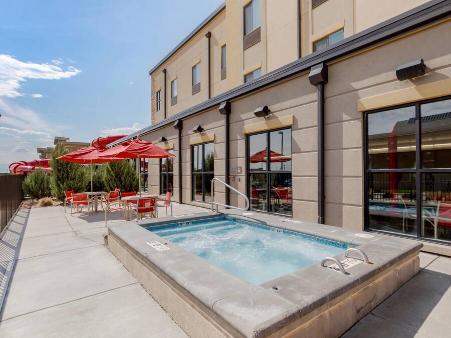Indoor pool, open 8:00 AM to 10:00 PM, pool umbrellas, pool loungers