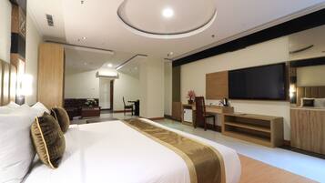 Suite Deluxe | 1 habitación, escritorio, wifi gratis y ropa de cama