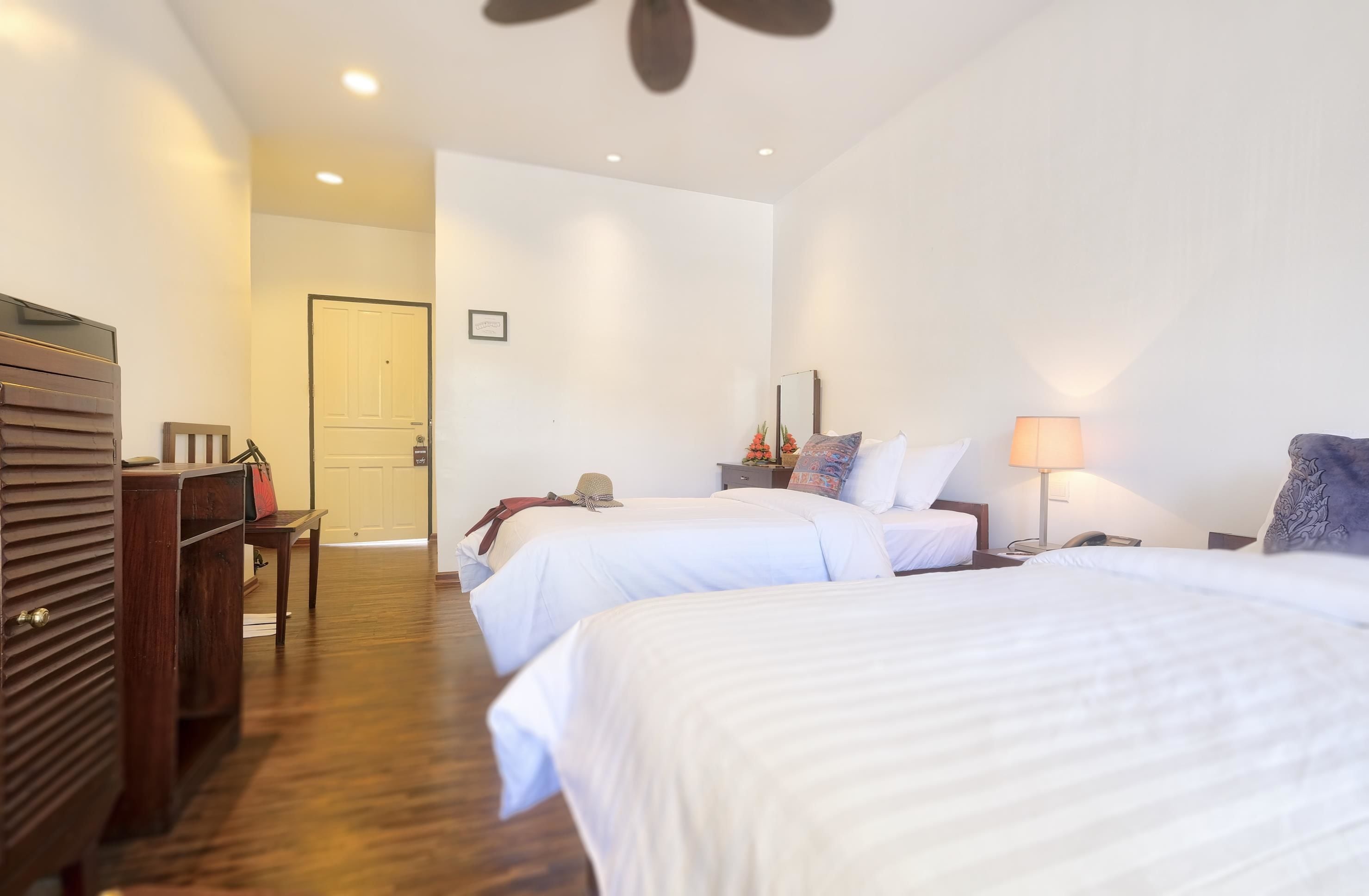 classic double or twin room, garden view | 1 bedroom, in-room safe, individually decorated, individually furnished