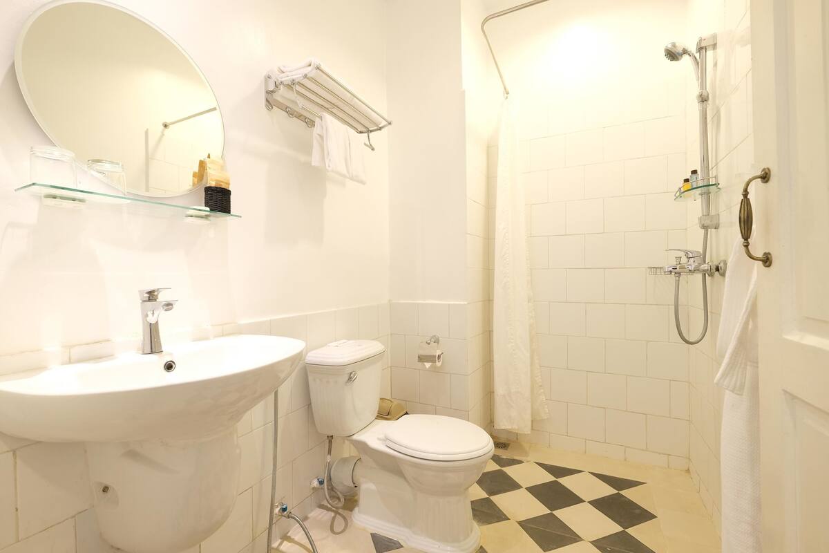 classic double or twin room, garden view | bathroom | shower, free toiletries, hair dryer, slippers