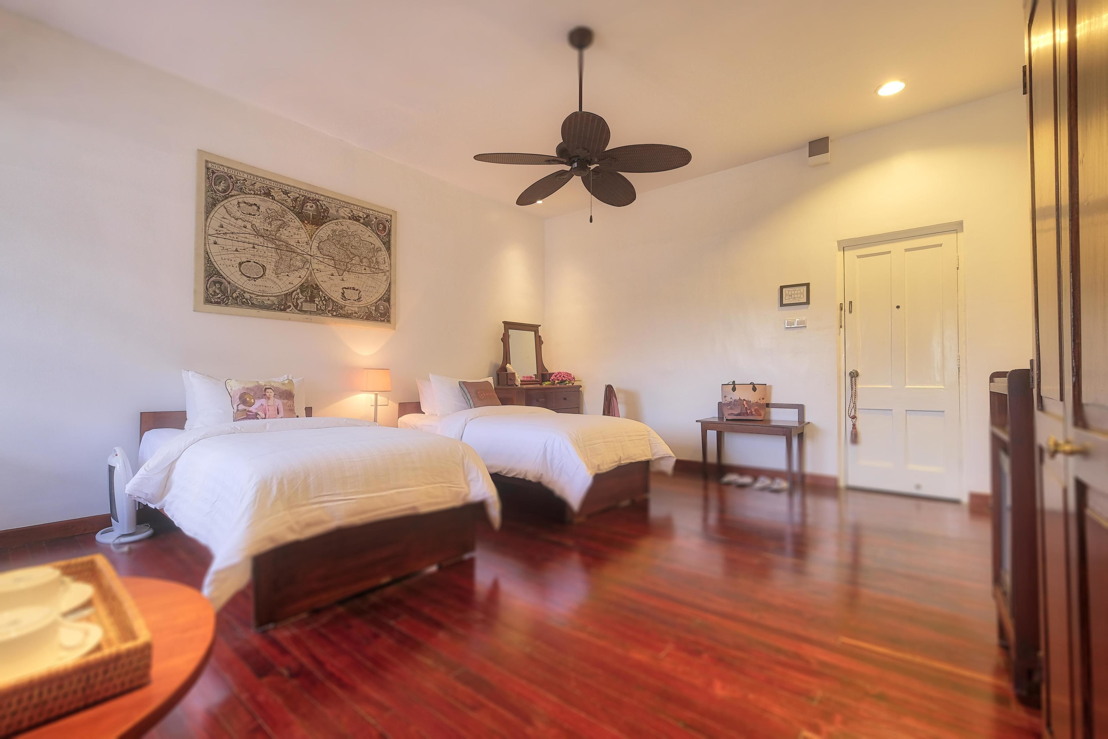 deluxe double or twin room, garden view | 1 bedroom, in-room safe, individually decorated, individually furnished