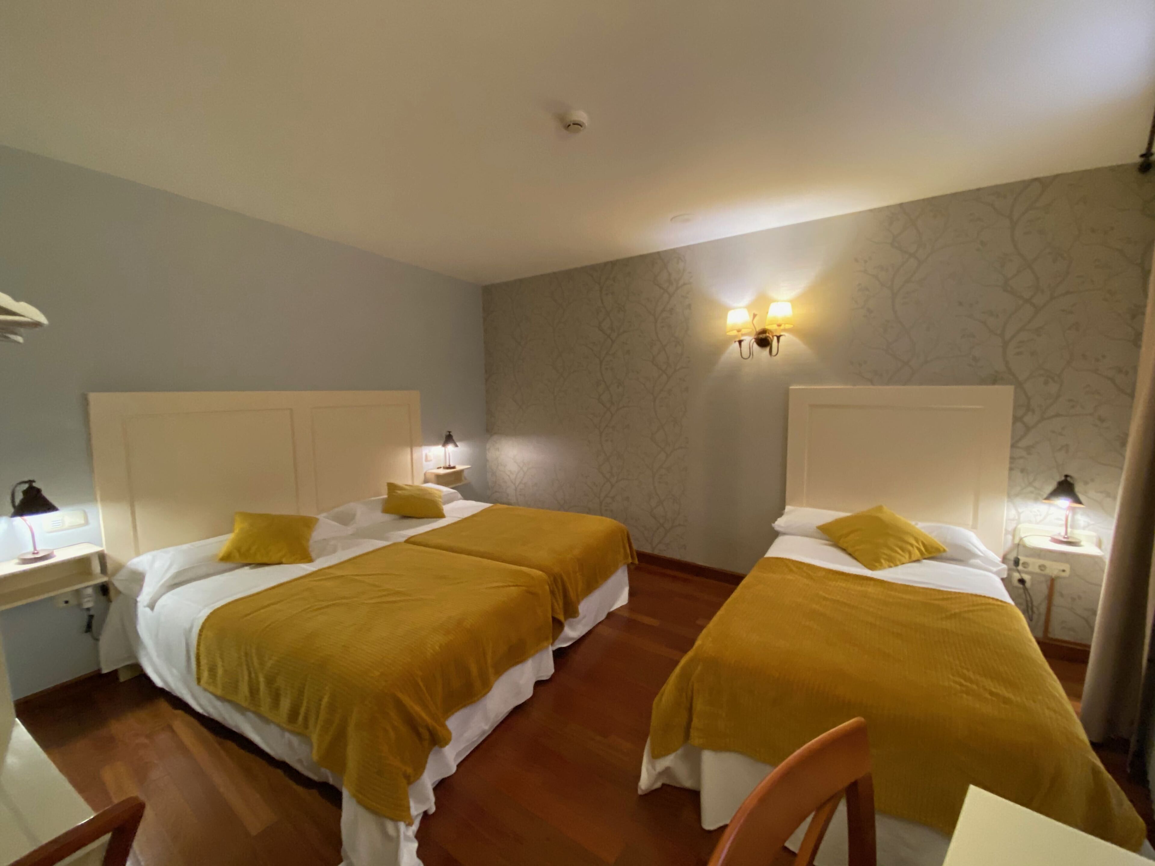standard triple room | 1 bedroom, in-room safe, individually decorated, individually furnished