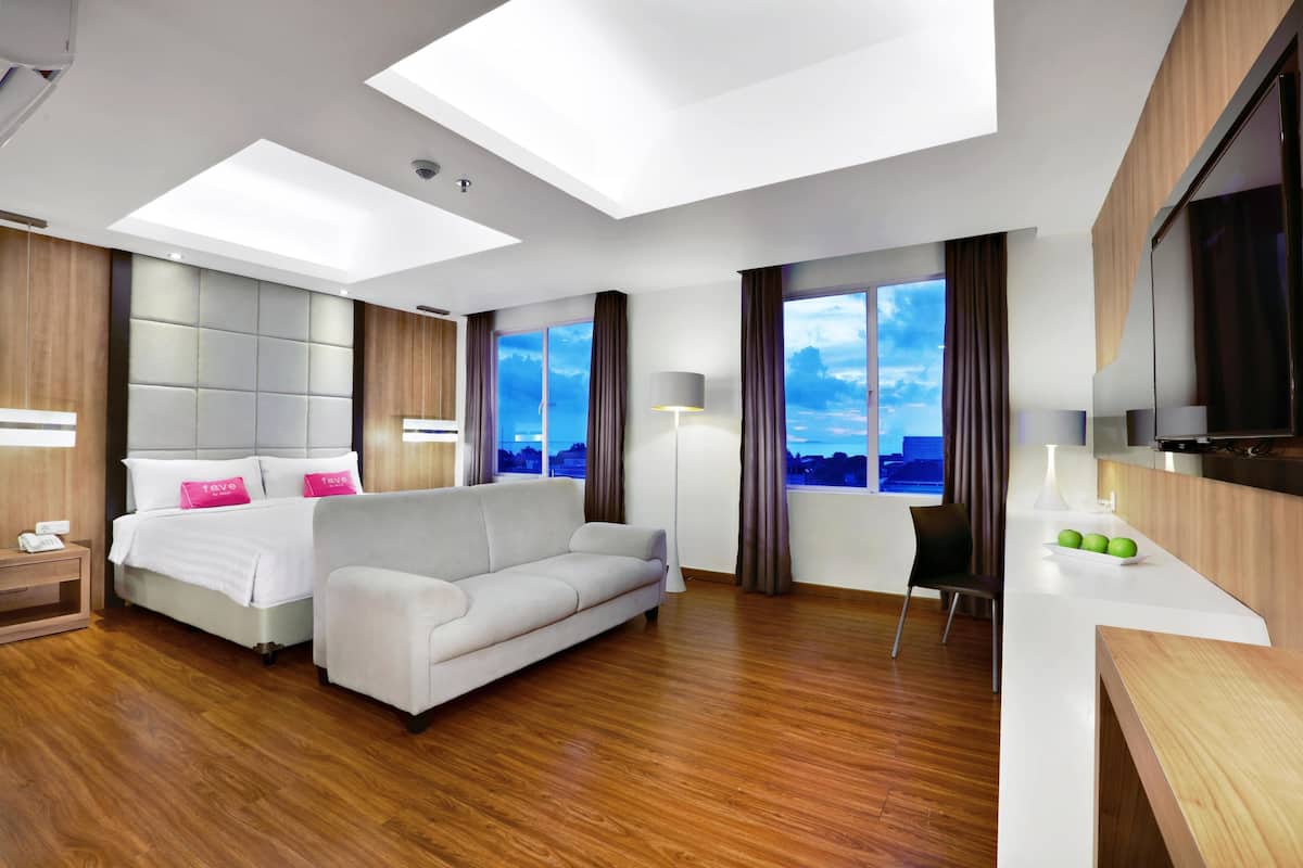 Suite junior | Caja fuerte, escritorio, wifi gratis y ropa de cama