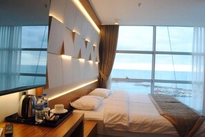Double or Twin Room, Sea View | Minibar, in-room safe, desk, free cots/infant beds
