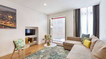 Lägenhet - 2 sovrum | Vardagsrum | Platt-tv