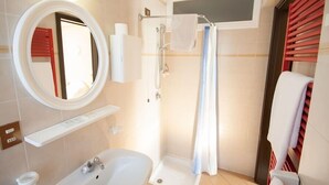 A bathroom with a shower, a sink, a mirror, and a towel rack. - Hotel San Marco (Bedonia)