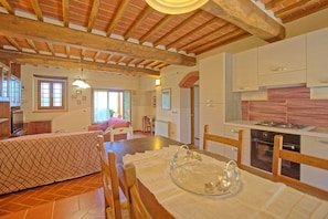 Villa | Private kitchen | Full-sized fridge, oven, toaster, cookware/dishes/utensils