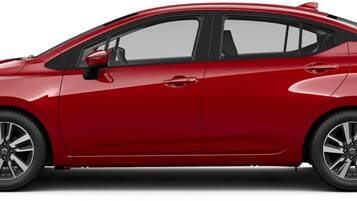 Un automóvil sedán rojo.